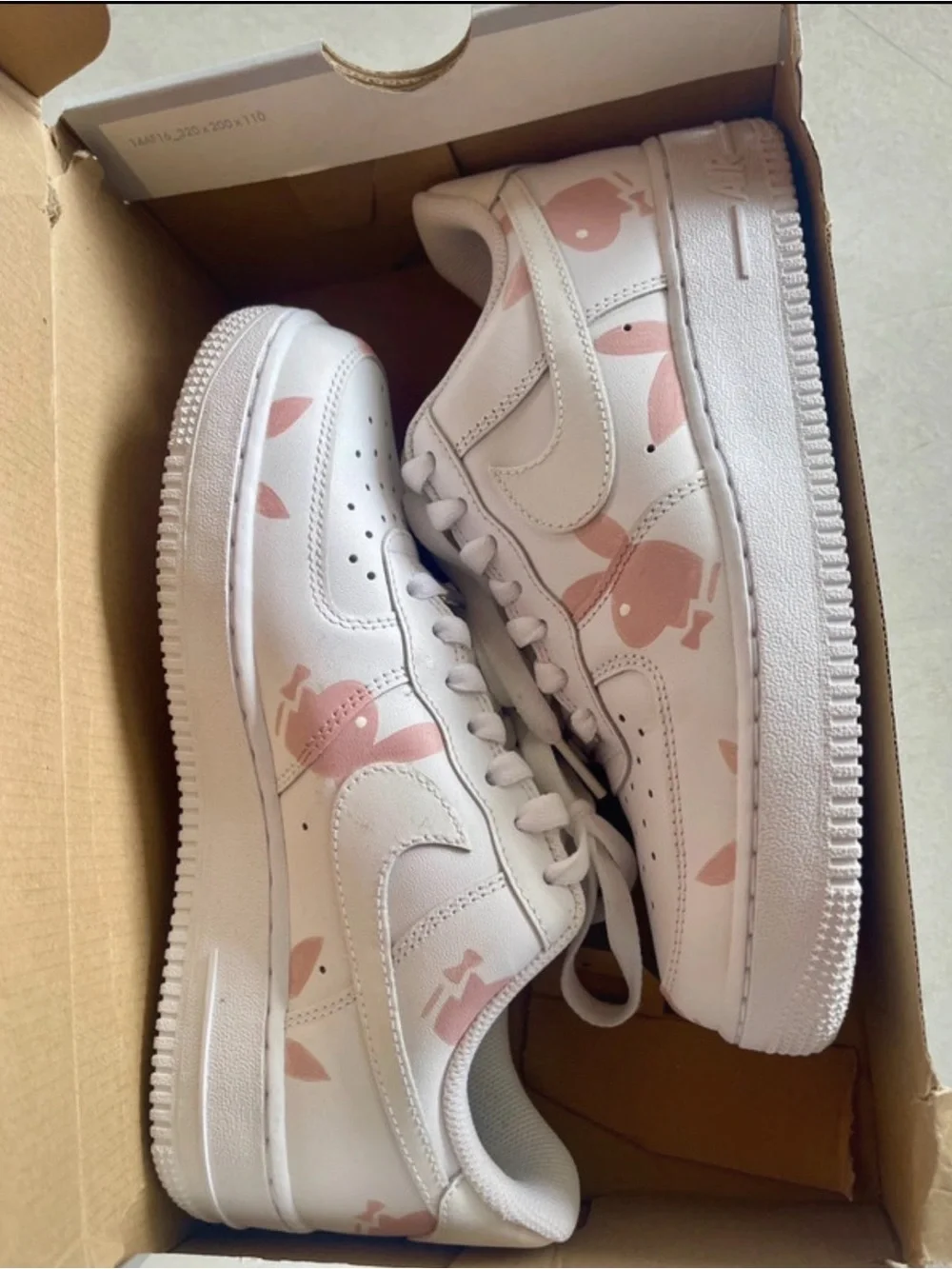 Nike Air Force White Sneakers with Pink Graphic Accents - Lace-Up Casual Shoes
